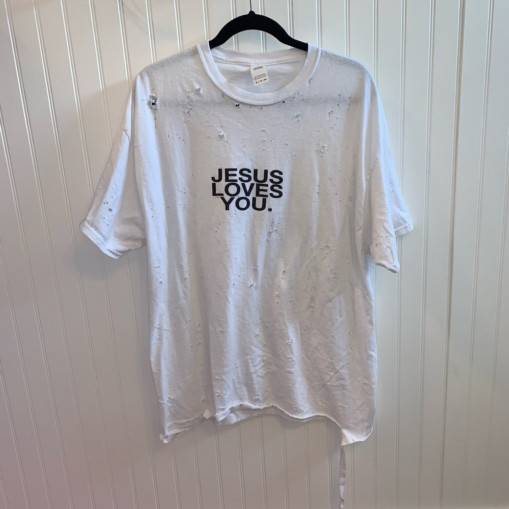 distressed “Jesus loves you” tee